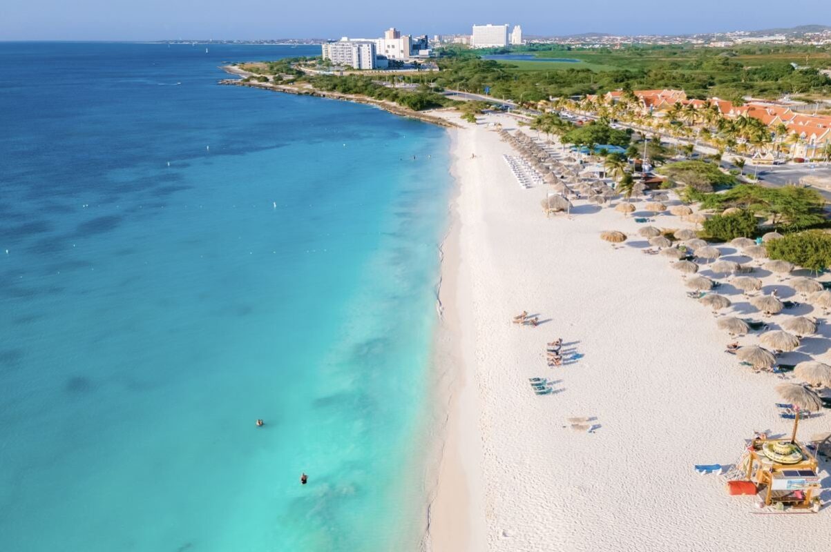 7 Sunny Beach Destinations With A Clear, Calm & Warm Ocean This Winter